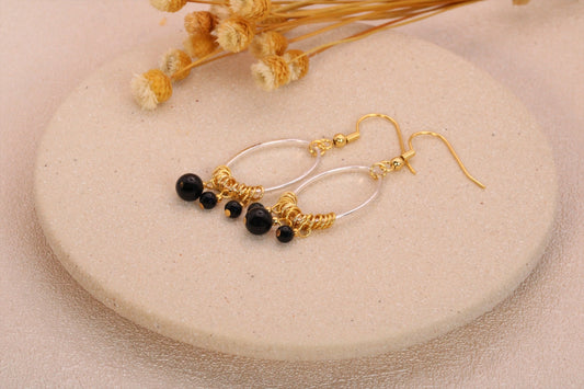 Boucles d'oreilles ovales ornées d'obsidienne noire