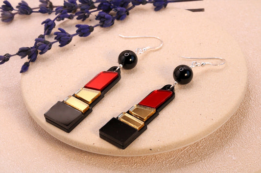 Boucles d'oreilles flamboyantes en onyx